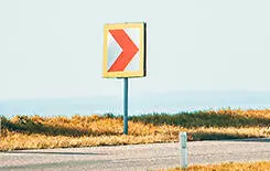  2021/10/Curve_FEATURE.jpg Road signs warning drivers about ahead dangerous curve