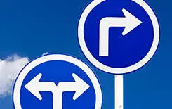  2021/10/arrow-road-245.jpg 11076035 - curved road traffic sign over blue sky,turn left
