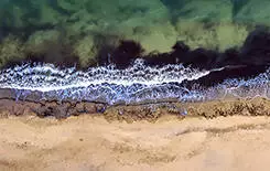  2021/10/coastline-245.jpg Top view aerial photo from flying drone of beautiful sea landscape with turquoise water with copy space for your advertising text message or promotional content. website background.