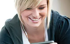  2021/10/woman-smartphone-music-smile-245.jpg Happy young woman listening to music on her mp3 player