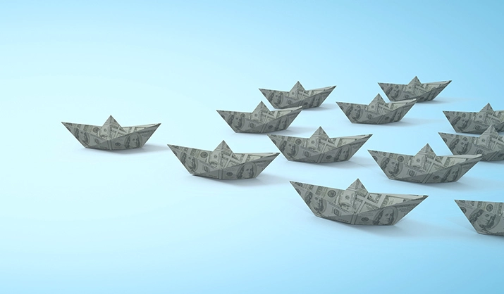 origami boats made from dollar bills