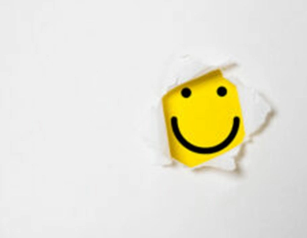 Smile face inside yellow background and white punch paper with copy space for positive mindset and client excellent evaluation concept , Customer experience and quality feedback concept. 2023/11/smile-face-breakthrough-600x464-1.jpg 