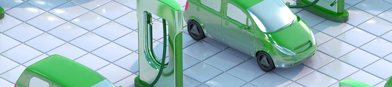 small green cars and charging stations on a tile floor