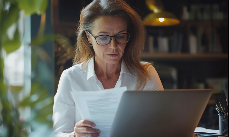 Mature woman reviewing her finances
