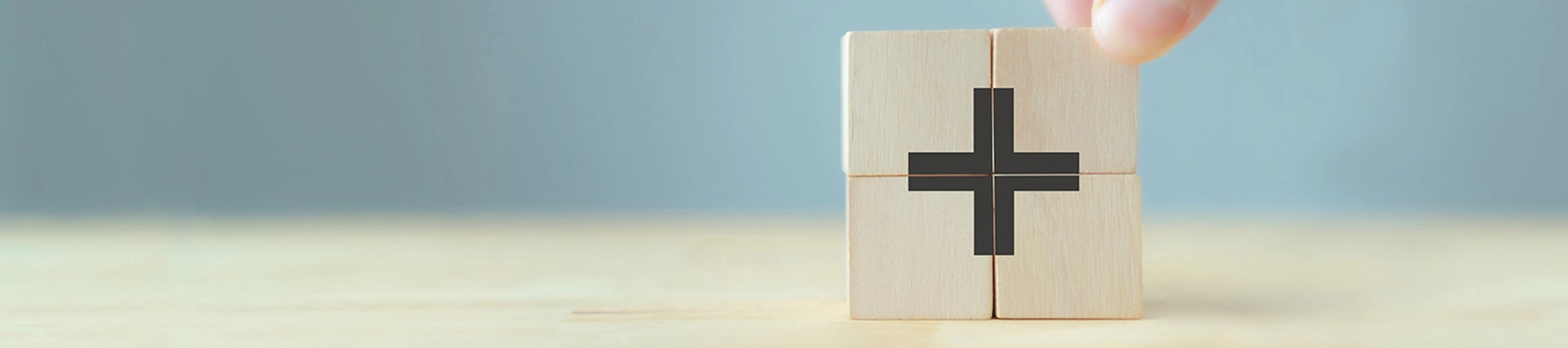 blocks creating a plus sign