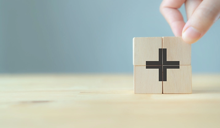blocks creating a plus sign