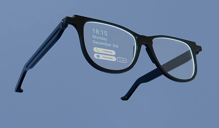 Rendering of black framed AR glasses on grey-blue background