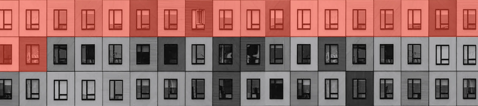 Image of an apartment building with many windows