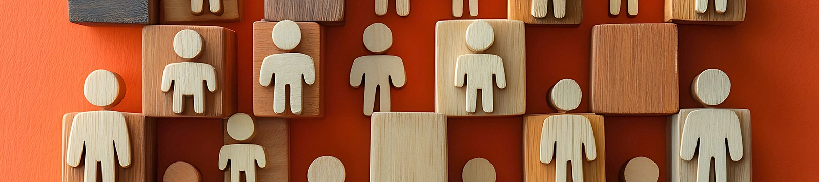 wooden blocks with icons of people