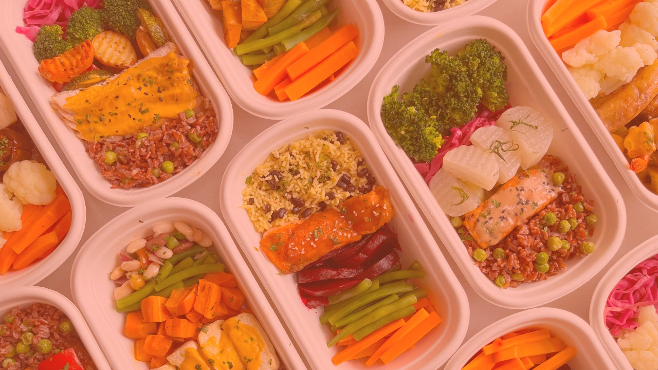 A top-down view of several prepackaged meals.